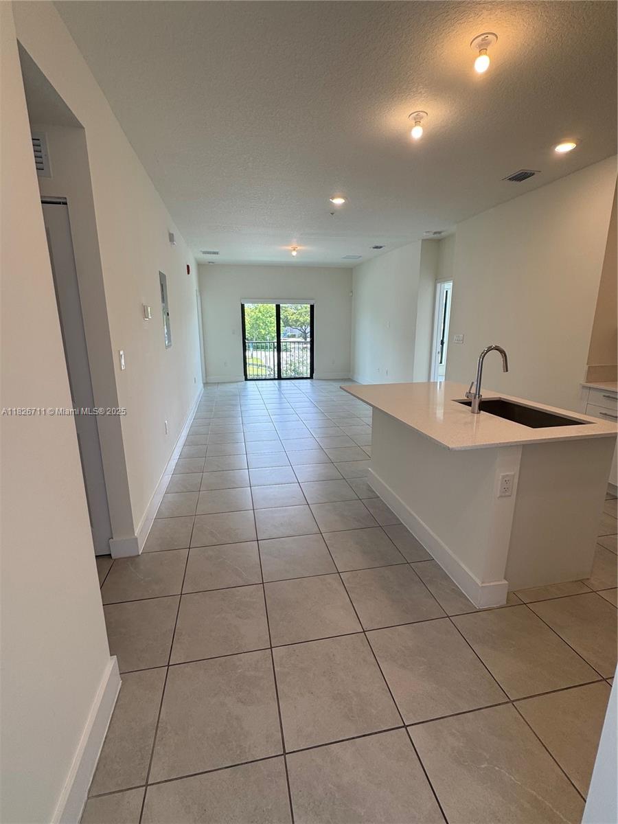 UNIT IN THE HEART OF DORAL !! AMAZING CORNER with ABUNDANT NATURAL LIGHT ON THE SECOND FLOOR. 2 MASTER BEDROOMS,2.5 BATHS, CERAMIC FLOOR, WITH STAINLESS STEEL APPLIANCES, WASHER/DRYER INSIDE THE UNIT. Excellent location, Close to Downtown Doral Park, Main Street, near City Place with plenty of restaurants, bars, libraries, and fashion stores. The community offers a resort-style pool, clubhouse, and fitness center.