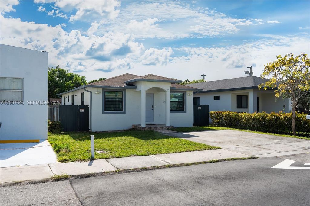 Photo of 308 NW 2nd Ave, Hallandale Beach, FL 33009 (MLS # A12001646)