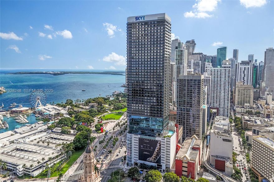 Stunning high-floor residence at The Elser Hotel & Residences in the heart of Downtown Miami. This beautifully appointed condo-hotel unit sits on the 46th floor and offers panoramic views overlooking Bayfront Park, Biscayne Bay, and Bayside Marketplace. Featuring floor-to-ceiling windows, an open layout, a fully equipped kitchen, modern finishes, and a private balcony to enjoy Miami’s skyline and water views. The Elser is a premier luxury condo-hotel with flexible daily rental capability and world-class amenities including a resort-style pool deck, a two-story fitness center, 24/7 concierge, valet, co-working spaces, and on-site dining and entertainment. Steps to the Kaseya Center, the Brightline station, Bayside, restaurants, nightlife, and the new shops and dining at Miami Worldcenter. A perfect opportunity for investors and end-users seeking exceptional convenience, views, and income potential
