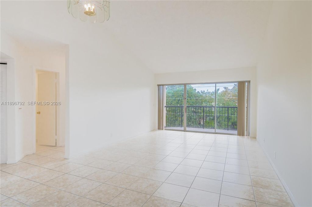 Photo of 9033 Wiles Rd #303, Coral Springs, FL 33067 (MLS # A11896792)