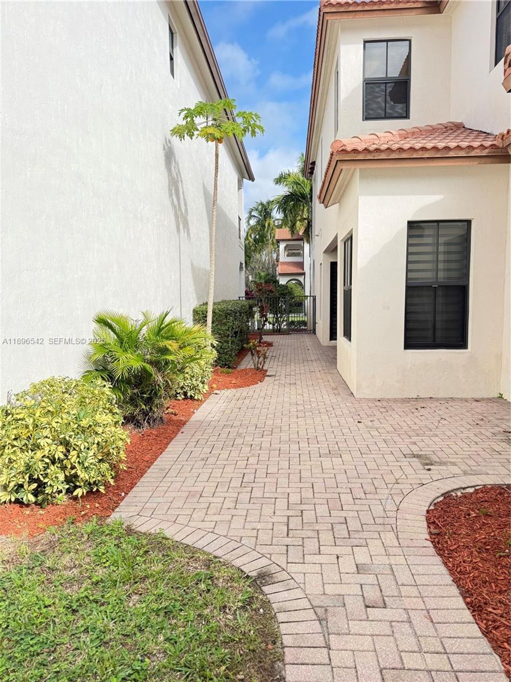 Photo of 8290 NW 39th Ct #8290, Cooper City, FL 33024 (MLS # A11896542)