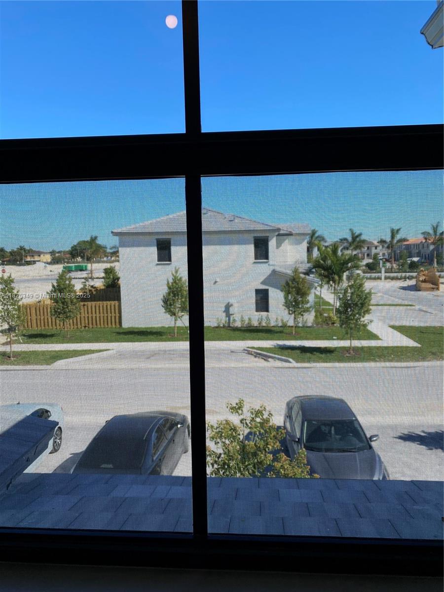 Investor Opportunity Tenant in Place! Don't miss this income-generating property leased Jan 2026. Ideal for investors seeking immediate cash flow! This spacious townhome features two master suites upstairs, plus a bedroom and full bath on the first floor—perfect for flexible living arrangements.
The open-concept main level is fully tiled and combines the family room, dining area, and modern kitchen, complete with stainless steel appliances. Enjoy the convenience of two assigned parking spaces right at your doorstep. Located in a gated community offering resort-style amenities, including a clubhouse, fitness center, swimming pool, and playgrounds. Just a short walk to two major shopping centers with a variety of restaurants and retail