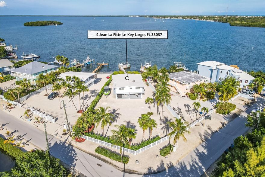 Bay Front home, ideally located in sought after community of Buccaneer Point. This updated 3/3 offers an open living floor plan and gorgeous open water and sunset views. Downstairs has storage room and bath. 19,000+ Sq. Ft. fenced in lot will accommodate plenty of parking and backyard space suitable for a pool and outside living areas.  Dock with direct access to Florida Bay and a short ride to Ocean Access. Move In ready with recent upgrades to live the Keys Lifestyle!