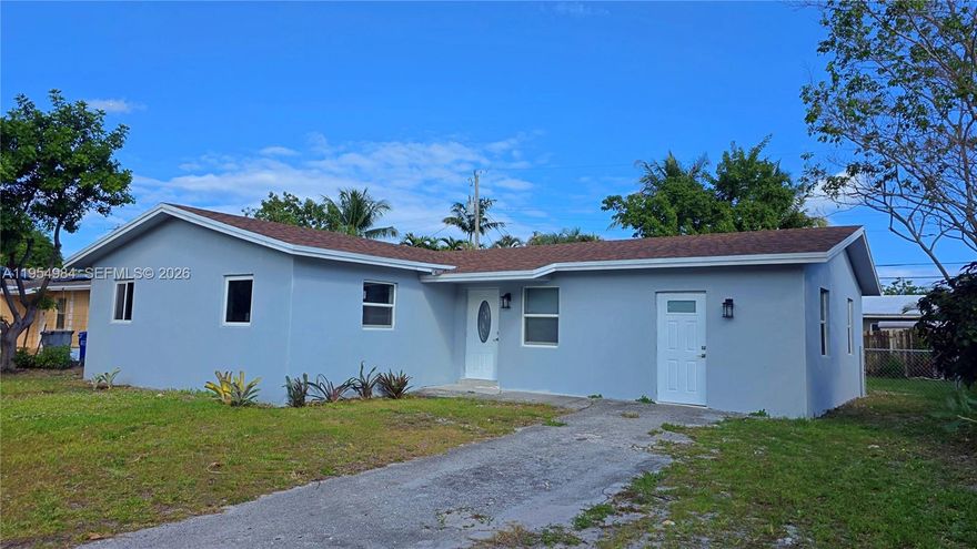 Fully Renovated 4-Bed/2-Bath Home in Pompano Beach – Turnkey & Income Ready! This beautifully redone 1,512 sq ft home is perfect for first-time buyers or savvy investors. Step into a bright open layout with stunning quartz countertops, matching quartz backsplash, stainless steel appliances, and modern finishes throughout. Enjoy spacious living areas with sleek ceramic tile flooring and recessed lighting. Both bathrooms are tastefully remodeled. One oversized bedroom has a private exterior entrance — ideal for a guest suite, rental income, or home office. Fresh interior and exterior paint, neutral tones, and move-in ready condition. Generous lot with mature trees, large yard, and extended driveway. No HOA! Located in the growing Kendall Green neighborhood with newly paved streets and city improvements adding value. Minutes to I-95, beaches, restaurants, and schools. Zoned single-family with great rental potential. Delivered vacant at closing — schedule a showing today and send your offer! May qualify for buyer credit at closing!