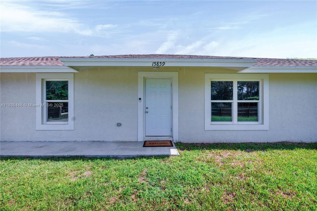 Photo of 15859 N 68th Ct N, Loxahatchee, FL 33470 (MLS # A11835486)