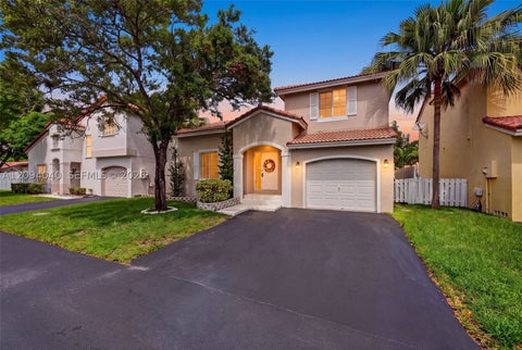 Photo of 1248 NW 125th Ter, Sunrise, FL 33323 (MLS # A12094040)