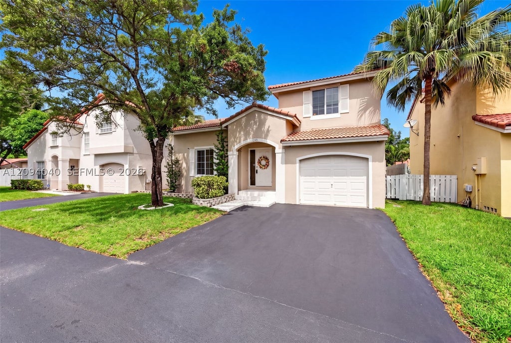 Photo of 1248 NW 125th Ter, Sunrise, FL 33323 (MLS # A12094040)
