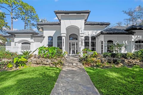 Photo of 5952 NW 66th Ave, Parkland, FL 33067 (MLS # A11976873)