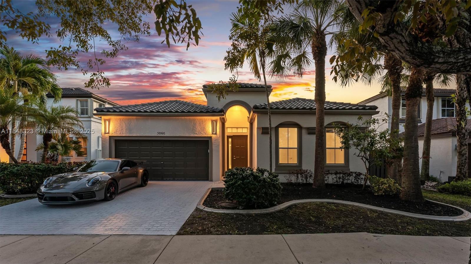 BRAND NEW ROOF + AC | Fully Renovated | Resort-Style Living. Skip the big-ticket worries, this home already has a brand-new roof and brand-new AC. Inside, fresh paint, smooth ceilings, recessed lighting, and designer fixtures create a modern, airy vibe. The kitchen shines with an extended quartz snack bar, stainless steel appliances, and open flow to the living spaces. Bathrooms are stylishly updated, and even the garage boasts a new motor and full service. All of this is in a gated, 24/7 monitored community loaded with amenities: resort-style pool, kiddie pool, spa, fitness center, basketball and tennis courts, pickleball, playgrounds, fishing dock, and more; All minutes from I-75, the Turnpike, top-rated schools, and endless shopping. Move in, unpack, and start living your dream.