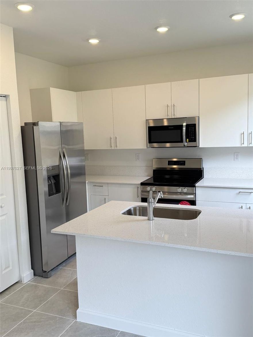 Be the first to live in this stunning brand-new unit townhouse in the highly desirable Altamira Community. Featuring 3 bedrooms, 2.5 bathrooms, and a 1-car garage, this modern home offers a spacious open floor plan with a fully equipped kitchen, quartz countertops, stainless steel appliances, and sleek cabinetry. The second floor includes plush carpeting in all bedrooms and in-unit laundry for added convenience. Enjoy a private, fenced patio ideal for relaxation or entertaining.   
**MOVE IN WITH JUST FIRST MONTH AND SECURITY DEPOSIT**  Realtors check broker remarks   
The community will soon offer amazing amenities like a golf course, tennis courts, gym, and pool. With easy access to the Turnpike and walking distance to schools, this home combines comfort, style, and convenience. Don’t miss out—it won’t last!