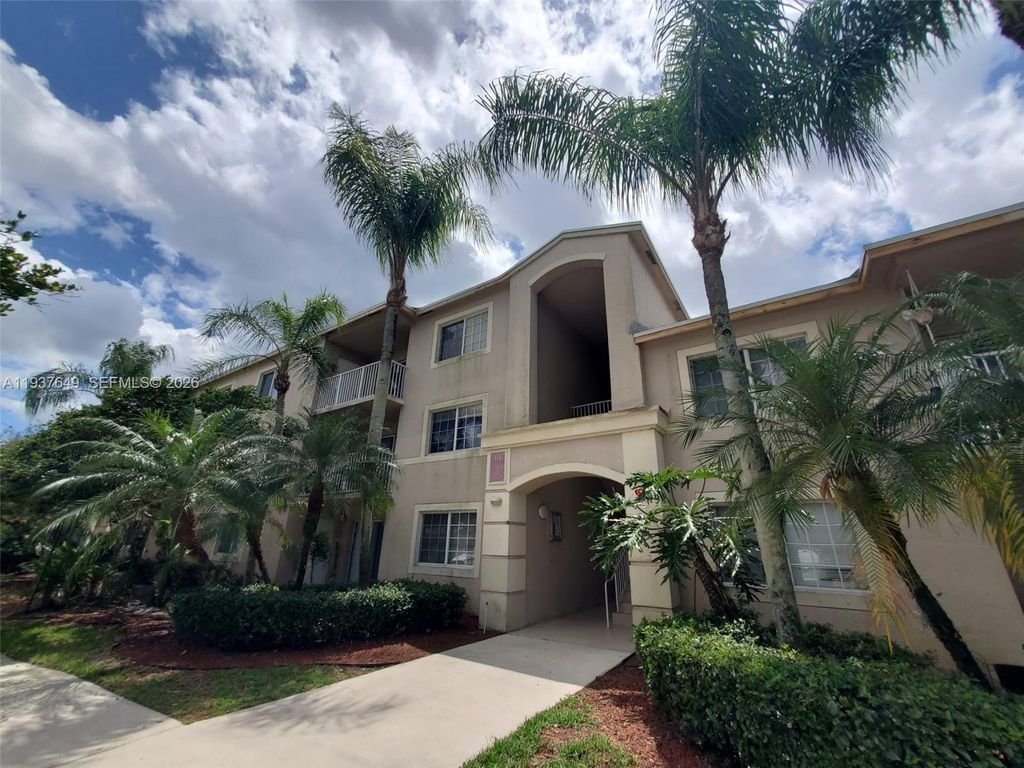 Photo of 5041 Wiles Rd #106, Coconut Creek, FL 33073 (MLS # A11937649)