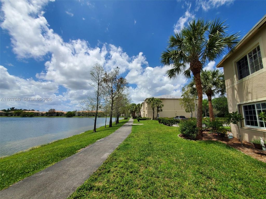 Photo of 5041 Wiles Rd #106, Coconut Creek, FL 33073 (MLS # A11937649)