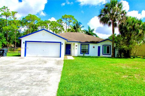 Photo of 13677 Temple Blvd, West Palm Beach, FL 33412 (MLS # A11950509)