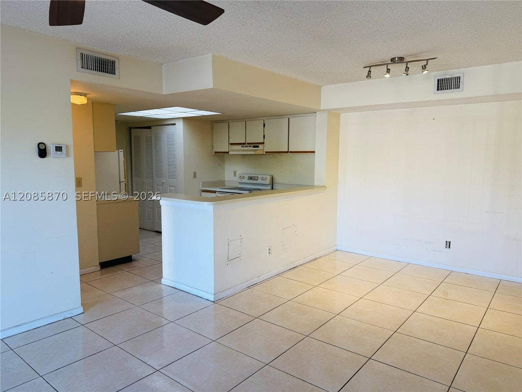 Photo of 9266 W Atlantic Blvd #1026, Coral Springs, FL 33071 (MLS # A12085870)