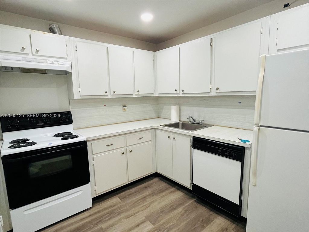 Photo of 401 Golden Isles Dr #716, Hallandale Beach, FL 33009 (MLS # A12005125)