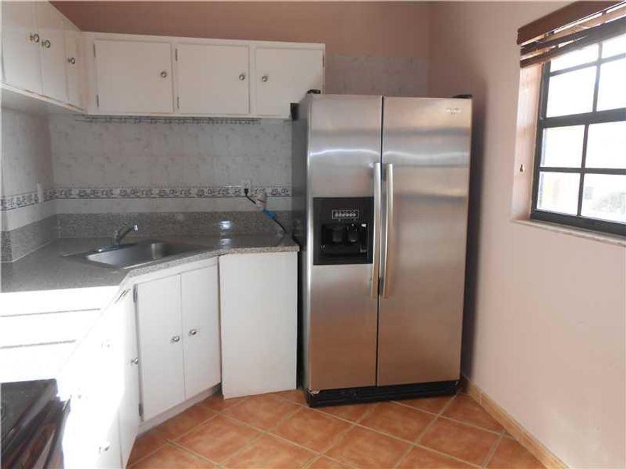 EXCELLENT 2-BED/2-BATH CONDO WITH A STUNNING LAKE VIEW IN THE HEART OF MIAMI LAKES! TILED FLOORS AND STAINLESS-STEEL REFRIGERATOR! COMMUNITY POOL WITH ELEVATOR! LOCATED IN A HIGHLY DESIRABLE AND SAFE COMMUNITY JUST BLOCKS AWAY FROM THE MAIN STREET PLAZA A ND DOZENS OF POSH SHOPPES AND RESTAURANTS!