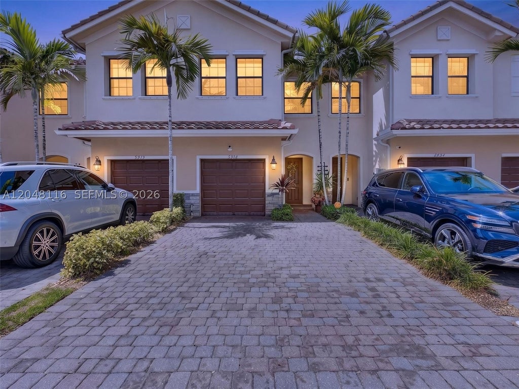 Photo of 5918 NW 56th Pl, Tamarac, FL 33319 (MLS # A12048116)