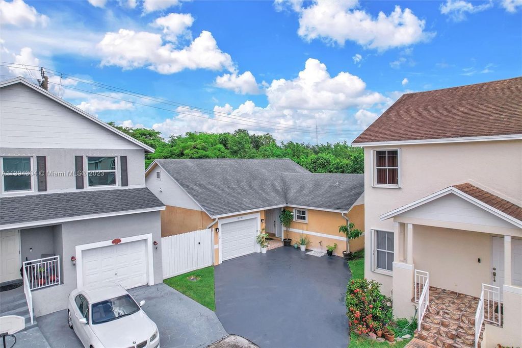 Photo of 10241 NW 6th St, Pembroke Pines, FL 33026 (MLS # A11394304)