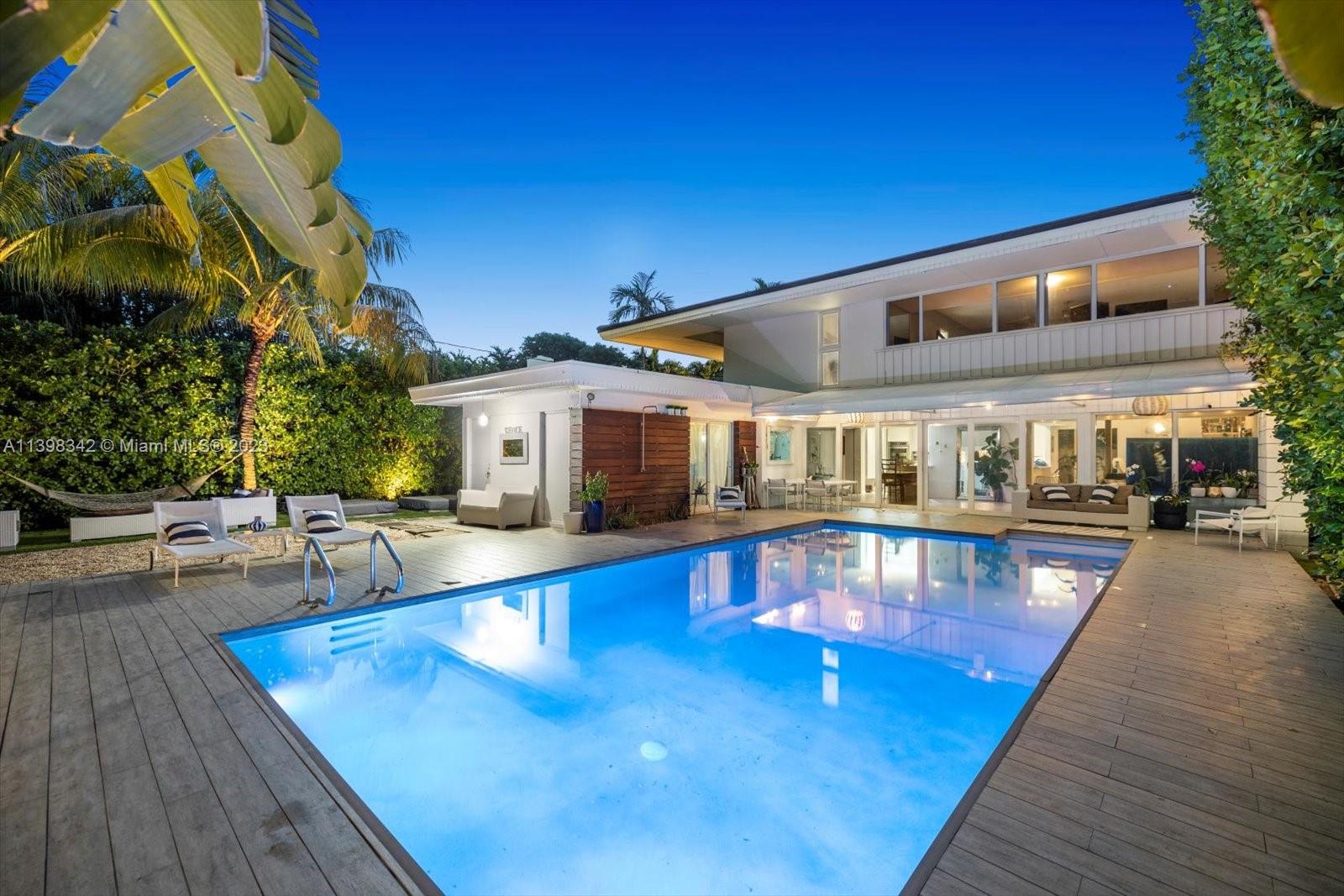 Welcome to Bay Breeze Manor! This remodeled, two-story Palm Beach-style home is nestled on 96th St, Miami Shores, just steps away from Biscayne Bay. Offering modern elegance, it features an open layout, abundant natural light, and a stunning pool. The gourmet kitchen, luxurious master suite, and inviting living spaces make it perfect for entertaining. Enjoy the tropical oasis of the landscaped grounds and the refreshing coastal breeze. Experience the best of Miami living with nearby amenities, dining, shopping, and cultural attractions. Make Bay Breeze Manor your luxurious coastal retreat. Brand new roof! A must see