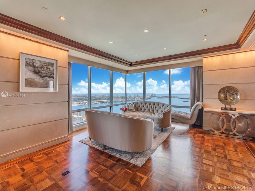 This Brickell stunner is situated on the 65th floor of Four Seasons and boasts some of the best views in Miami! This 4,470 sqft North East corner unit features traditional custom millwork, coffered ceilings, wood floors, large windows for natural light, two full size kitchens, home automation and an open floor plan. Building features world class amenities, restaurant, Equinox Fitness Club and is within walking distance to fine dining, shops and night life.