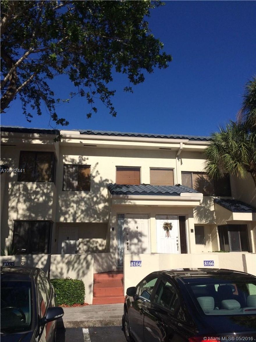 ONEOF THE ONLY FHA APPROVED CONDOS IN BROWARD.  Absolutely Lovely 2nd Floor Condo (first floor entry). Beautifully landscaped community with waterfront pool.  Balcony view onto a city park, no backyard neighbors or street traffic noise.  Two giant bedrooms and two spacious full baths.  Washer/dryer in unit extra storage on patio.  Seller motivated for quick sale. Low HOA dues, prefect for investor [can rent for $1450/month] or owner occupant. Green, light, bright, safe and friendly community!