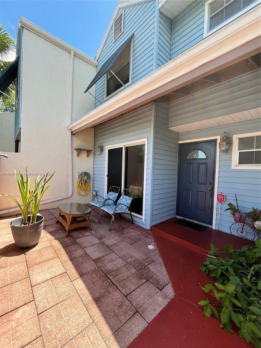 FHA buyers welcome! Own this home with as little as 3.5% down! This beautifully maintained 2 bedroom, 2.5 bath townhome offers premier living with one of the community’s largest, private backyards overlooking a water view. The spacious dine-in kitchen opens to a front courtyard, perfect for outdoor meals, while the back patio opens to the vast backyard for more outdoor living. A full-size washer & dryer are included. Upstairs, the newly rebuilt deck of the primary suite is ideal for enjoying the serene surroundings. Enjoy a quiet retreat minutes from top shopping & dining. Coconut Key residents enjoy resort-style amenities without high HOA fees, including a pool, sauna, tennis courts, indoor handball court, and fitness center. Schedule your private showing today & step into your new home.