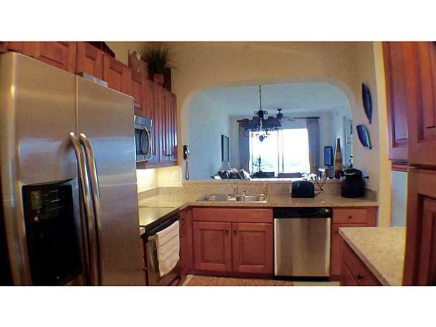 MOTIVATED SELLER GET THIS ONE TURN KEY WITH ALL THE FURNITURE, AND TOP QUALITY WINDOW TREATMENT GRANITE COUNTER TOP ALL STAINLESS STEEL APPLIANCES IN THE KITCHEN. ROYAL POINT OFFER ALL IMPACT WINDOWS AND DOOR THAT WI LL PROTECT YOUR INVESTMENT. IN PALM AIRE THE LOWEST MONTLY CONDO FESS AT $270.00 A MONYH. THE BUILDING IS NEXT TO THE GEORGE BRUMMER CITY PARK WITH FREE 6 TENNIS COURT, BASKET BALL COURT AND PLAYGROUND THE THE LITTLE ONE. YOU CANNOT MORE FOR YOUR MONEY.
