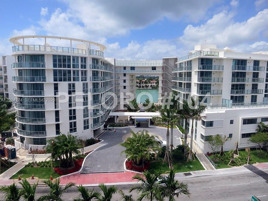 Experience elevated waterfront living at Peloro, an exclusive boutique condominium in mid-Miami Beach. This unique, two-story duplex offers a sophisticated open-plan layout spanning two levels, featuring seamless laminate flooring throughout. The residence provides a distinct separation of space, with the main entry, living area, and bedroom situated on the second level. A private staircase leads down to a versatile ground-floor den, offering convenient street-level access.  Located on the serene bayside, this residence offers the best of both worlds with beach access directly across the street. Residents enjoy access to premium luxury amenities, including a stunning grand atrium with cascading waterfalls, a waterfront pool, a state-of-the-art fitness center, and professional concierge services. Parking is managed exclusively via valet service. Currently rented at $2,920 per month through November 13, 2026, this property represents a premier opportunity in a highly desirable coastal enclave.  Please note that parking at Peloro is by valet only.