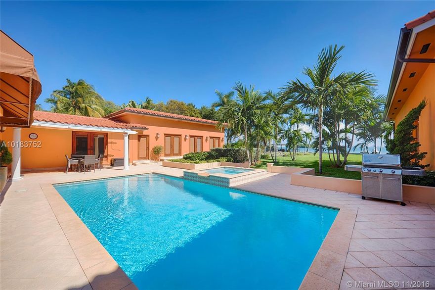 Located in the most desired Morningside area this modern Mediterranean Bayfront home sits on a completely gated, oversized 36,750 corner lot. The home boasts 4,707 SF w/Terracotta floors, large living & dining areas, open gourmet kitchen & family room. Spacious master suite faces open bay w/walk-in closet  & master bath w/sunken Jacuzzi tub.  Outdoor features pool w/Jacuzzi, 125FT of WF, 2 jetski lifts, long wooden walkway to a private gazebo with unobstructed views of Biscayne Bay.