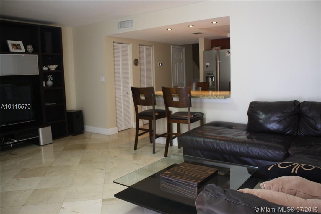 Fully remodeled two story townhouse in most desirable Three Islands are. Great location,great property. Full 3 bedrooms plus additional spacious bedroom that can be office or guest room. Stainless steel appliances,marble floors, granite countertops and vanities, modern kitchen. Corner unit, 2 parking spaces. Tennis,sauna,heated pool,club house. Perfect location,close to everything.10 minutes walk to the beach. Across the J.Scavo park,big new playground, dog parks.Can be partially furnished.Small pets OK.