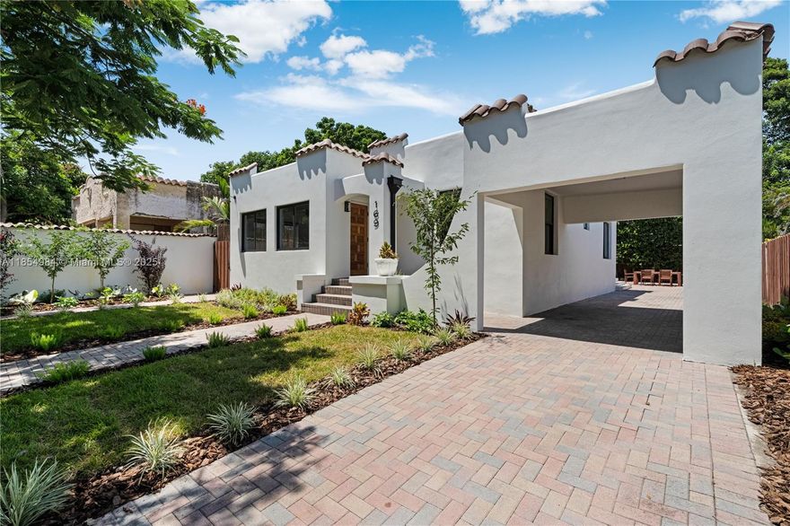 This is the one. walking distance to Design District and Ready to move in. Mission style architecture. fenced, manicured landscape, sprinklers. Impact glass windows, 3 bedrooms 2 bathrooms with lot of outside space .Carport. bright and cheerful. Beautiful wood like tile floors, warm colors.  Open kitchen with marble backsplash and Stainless steel appliances , natural gas .Tankless water heather, Two bedrooms sharing one bathroom with shower , Oversized Master suite with large marble shower . California Closets. in every bedroom. Large backyard area, with pergola. Room for a pool. working fireplace. !!LOCATED in Buena Vista East Historic District (from NE 42nd Street to NE 48th St.). Please check Unbranded Matterport and video.