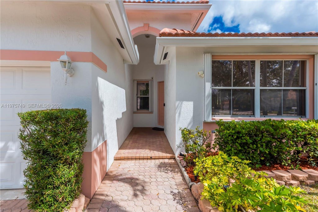 Photo of 12109 NW 52nd Ct, Coral Springs, FL 33076 (MLS # A11975749)