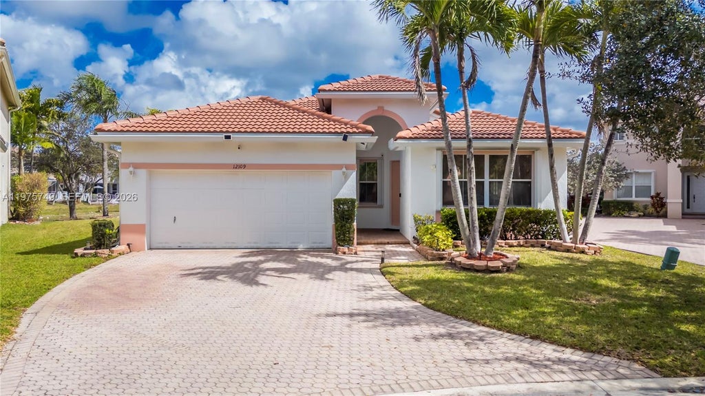Photo of 12109 NW 52nd Ct, Coral Springs, FL 33076 (MLS # A11975749)