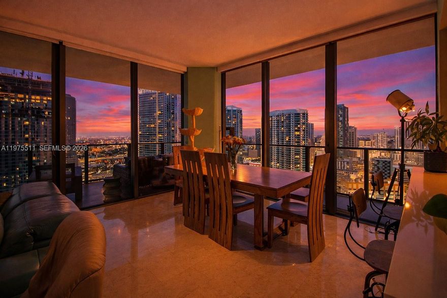 Best-priced 26th-floor corner unit in Brickell’s Reach high-rise! Enjoy breathtaking sunsets and dramatic evening views with your stunning wraparound balcony showing the Miami River and the Brickell and Downtown skylines. Floor-to-ceiling windows with electric shades flood the open layout with natural light. Polished marble floors, custom built-out closets, and upgraded lighting throughout. Chef’s kitchen features Italkraft cabinetry, premium Bosch appliances, upgraded faucet, and instant hot water dispenser. Split-bedroom plan with spacious primary suite offering soaking tub, large shower, floating shelves, and generous closet space. Custom-built added storage closet in second bathroom. Enjoy resort-style amenities: 2 pools, 2 hot tubs, fitness center with yoga classes, spa, playroom, business center, BBQ courtyard, and direct access to Brickell City Centre which includes luxury stores, variety of restaurants, and CMX cinemas. Enhanced security with dual lobbies/checkpoints, 4 daily valet guest passes.  Walk to the bay, Mary Brickell Village, Bayside and Bayfront Park, Whole Foods, Publix, Metro-mover, and Metrorail. One of the best-positioned buildings in Brickell with easy and quick access to I-95, 836, Downtown, and Key Biscayne beaches. Remarkable opportunity; make your offer today! For Showings please contact Ruben.