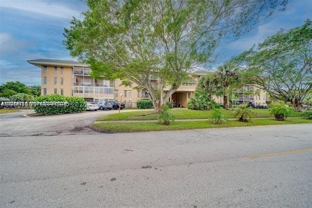 Photo of 4848 NW 24th Ct #230, Lauderdale Lakes, FL 33313 (MLS # A12067505)
