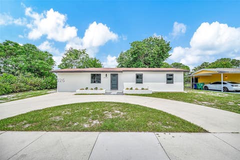 Photo of 19301 NW 52nd Ave, Miami Gardens, FL 33055 (MLS # A12061297)