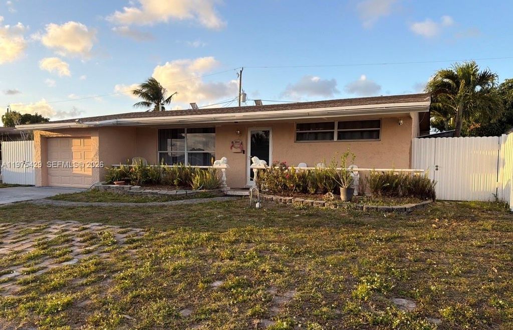 Photo of 8641 NW 25th Ct, Sunrise, FL 33322 (MLS # A11975429)