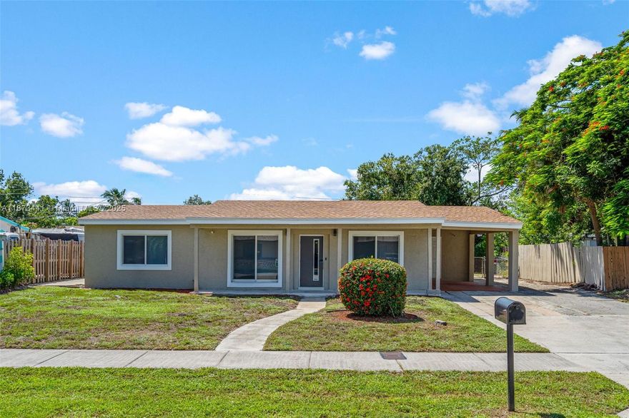 Beautiful Fully remodeled 3BR/2BA single-family home. Bright and open layout connects the living area to a brand-new kitchen with an eat-in island, pantry, and a separate dining area—ideal for everyday living and entertaining with a large backyard. The primary suite includes an updated master bathroom. The secondary bath is refreshed and spacious. New, full-size washer & dryer and all new appliances. Covered carport plus driveway parking and storage closet. Impact windows and door. Security System and Cameras. Located on a residential street with convenient access to shopping, dining, and major routes. Available for quick move-in. Easy to show—schedule your tour today.