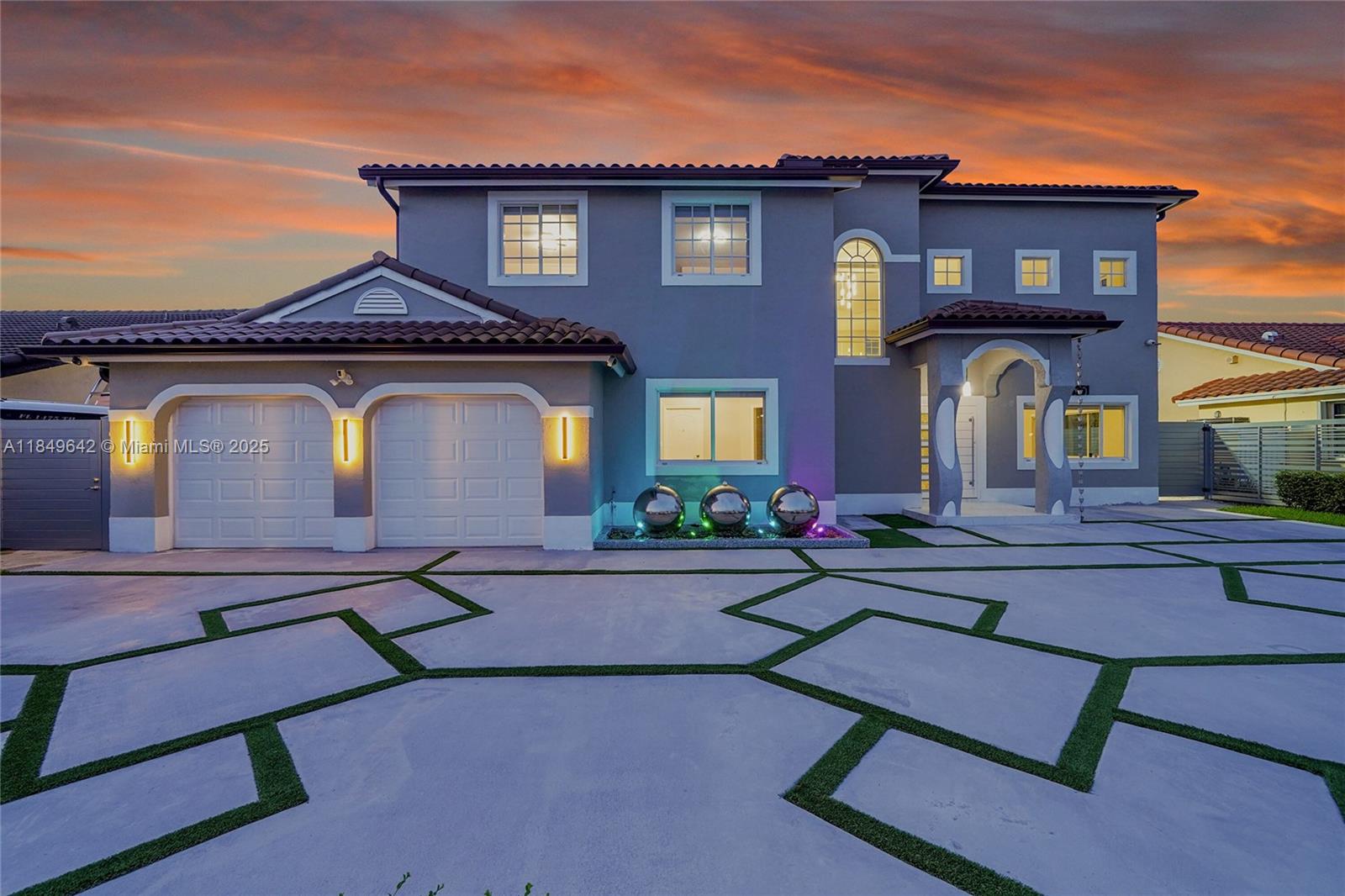 This fully upgraded 4BD/4BA home sits on a spacious lot and showcases over $250K in premium upgrades! Enjoy peace of mind with a 2021 roof, new AC, impact windows, and a new custom impact front door. The stunning interior features porcelain flooring, modern lighting, and a glass staircase that elevates the open-concept layout. The remodeled pool includes a waterfall feature, new heater, and is surrounded by a new patio with a complete outdoor kitchen and island—perfect for entertaining. Additional highlights include a glass koi pond, insulated garage under A/C, metal fencing, concrete driveway, and a beautifully landscaped yard. Located in a sought-after area with no HOA and close to top schools and shopping. Truly move-in ready!
