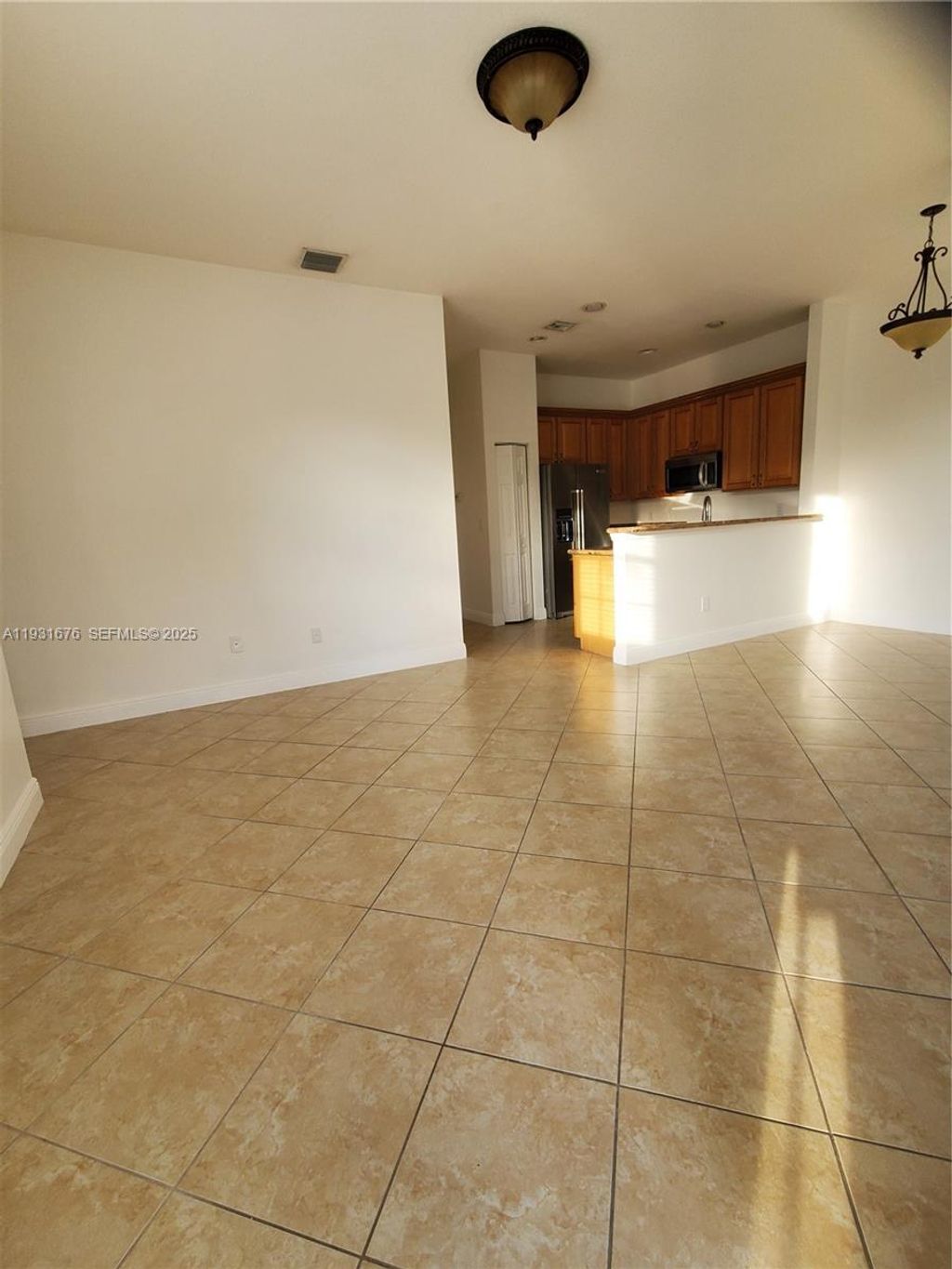 Photo of 5869 Hampton Hills Blvd, Tamarac, FL 33321 (MLS # A11931676)