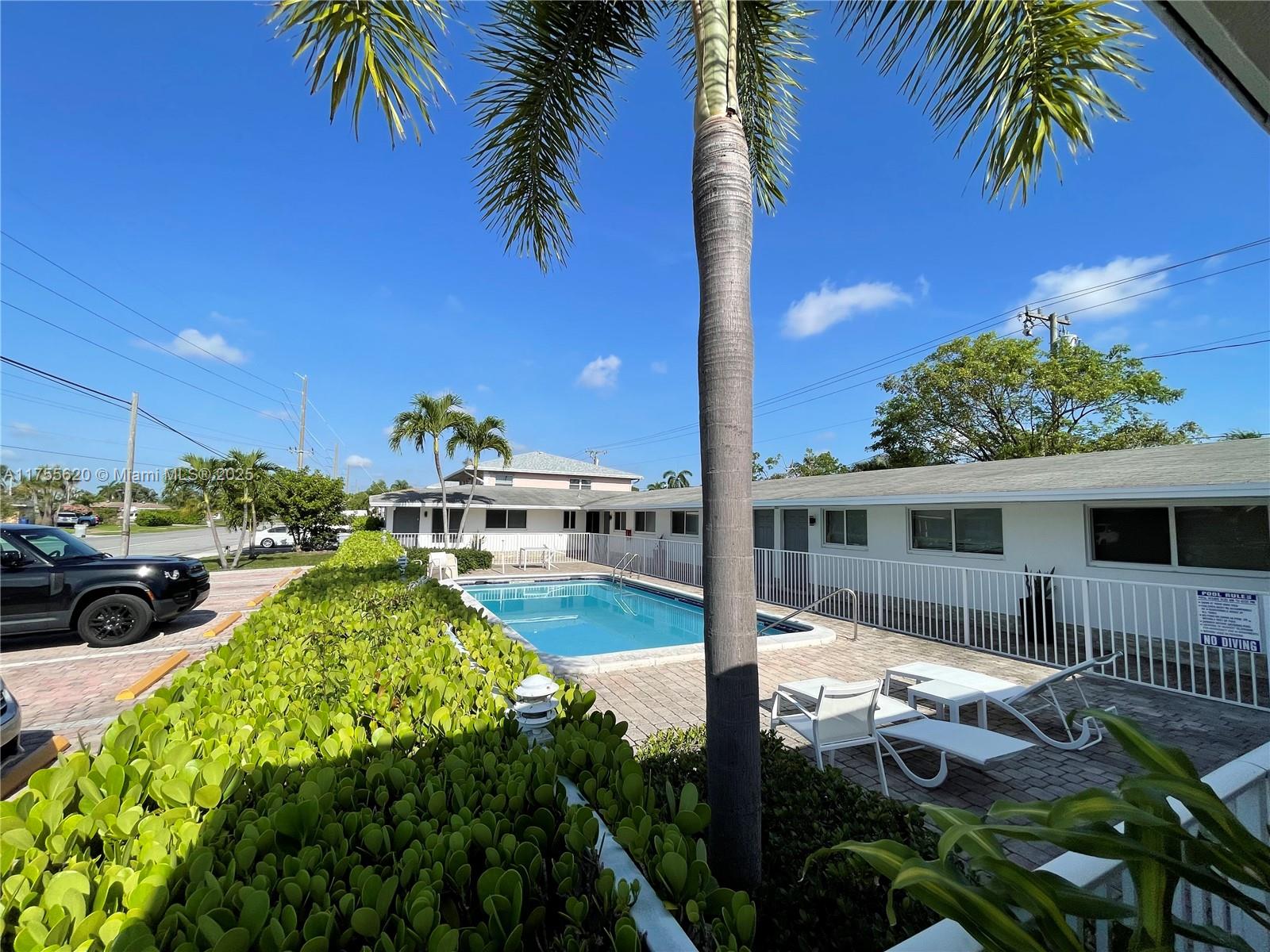 GREAT INVESTMENT OPPORTUNITY 8-UNIT MULTI-FAMILY (plus a small office room for short term renters) IN THE HEART OF POMPANO BEACH. ~ 3.5 MILES TO THE BEACH. RENOVATED BUILDING W/FENCED IN POOL, Two 2/1's and Six 1/1's with all updated interior and exterior, new roof and beautiful swimming pool area, impact doors and window, fenced pool, etc... Plenty of parking and guest parking. Fully tenant occupied with annual leases. Kitchens have stainless steel appliances, granite countertops and cherry wood cabinets. Property under 24/7 security camera. Actual Cap Rate: 5.85%, Proforma Cap Rate 5.92 Income: $168,000. NOI: $116,220.36. Don’t miss this opportunity!