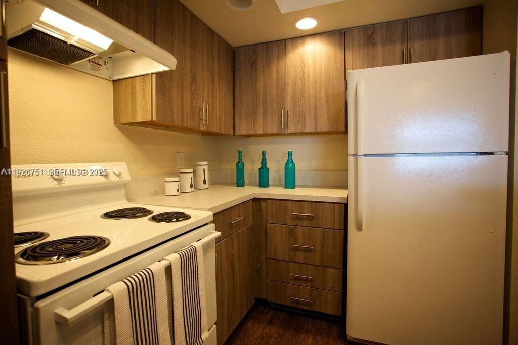 Photo of 12400 Vista Isles Dr #1414, Sunrise, FL 33325 (MLS # A11926751)