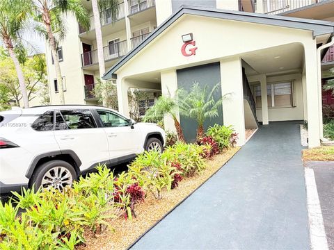 Photo of 1200 SW 130TH Ave #101G, Pembroke Pines, FL 33027 (MLS # A11958976)