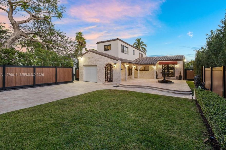 Beautifully renovated turnkey home on prestigious Alton Rd offering privacy on a sprawling 9,200 SF lot. This stunning residence features 4 bedrooms, 4 full baths, plus a detached guest house. Soaring beamed ceilings, marble floors, a grand fireplace, chef’s kitchen with quartz countertops and Sub-Zero/Wolf appliances, and smart-home upgrades throughout. Brand-new 2025 zero-maintenance saltwater pool with sauna, cold plunge, outdoor TV and sound system. Impact windows and doors, security system, electric gate, car lift garage, new travertine, lush landscaping, and iPhone-controlled systems. Minutes to beaches, South Beach, downtown, top schools and parks. A rare must-see.