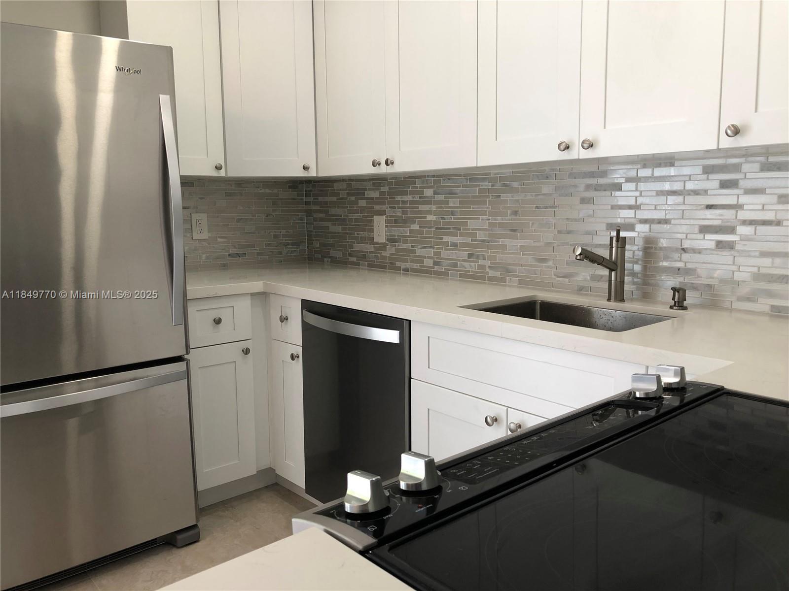 Beautifully renovated 2-bed, 1.5-bath condo in Miami’s vibrant Upper East Side. This two-story unit lives like a townhouse, featuring high-end finishes, modern appliances, in-unit washer/dryer, and stunning floors throughout. The sleek kitchen is fully equipped, while the spa-like upstairs bathroom and updated downstairs half-bath add luxury. Enjoy the best view in the building from your private balcony overlooking the pool and river. Includes accordion hurricane shutters, assigned parking, BBQ area, sauna, and sparkling pool. Well-maintained, clean building in a prime location near Midtown, Wynwood, Design District, and minutes to Miami Beach. No pets allowed.