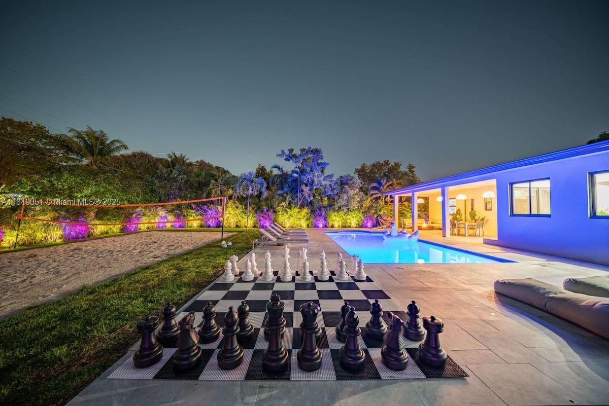 Stunning fully renovated 5BR/3BA home available for annual lease—seasonal term considered at premium rate. Features include heated saltwater pool, sand volleyball court, fire pit lounge, and lush private yard. Inside offers modern open layout, marble floors, designer kitchen, pool table, and smart TVs in all rooms. Ideal for families or executives seeking luxury and comfort. Centrally located near top schools, parks, and major airports. Pet-friendly. Pool heating optional. Easy to show—contact LA for terms.