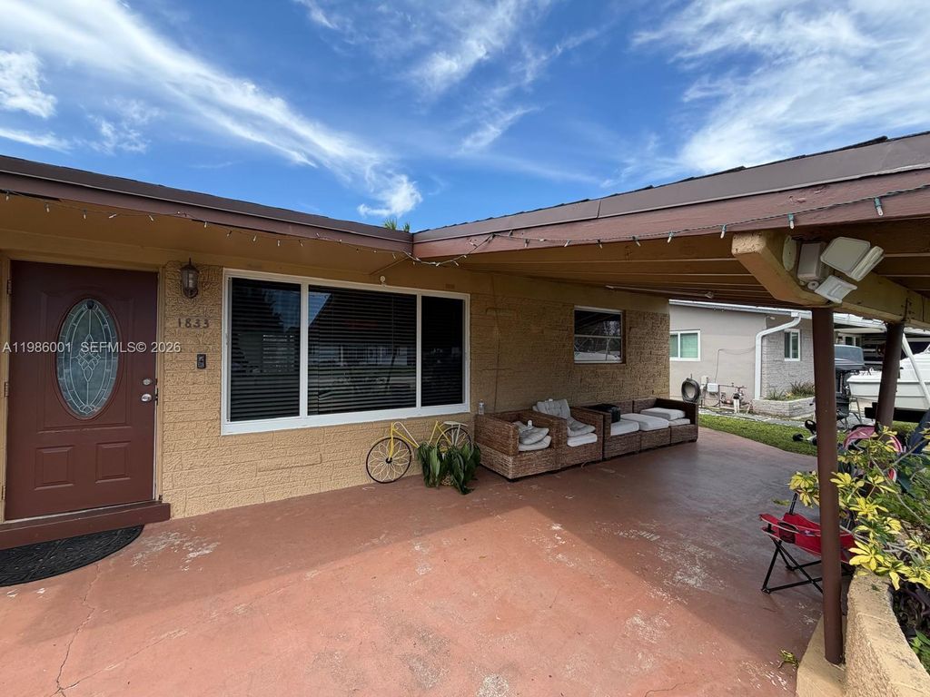 Photo of 1833 SW 43rd Ave, Fort Lauderdale, FL 33317 (MLS # A11986001)