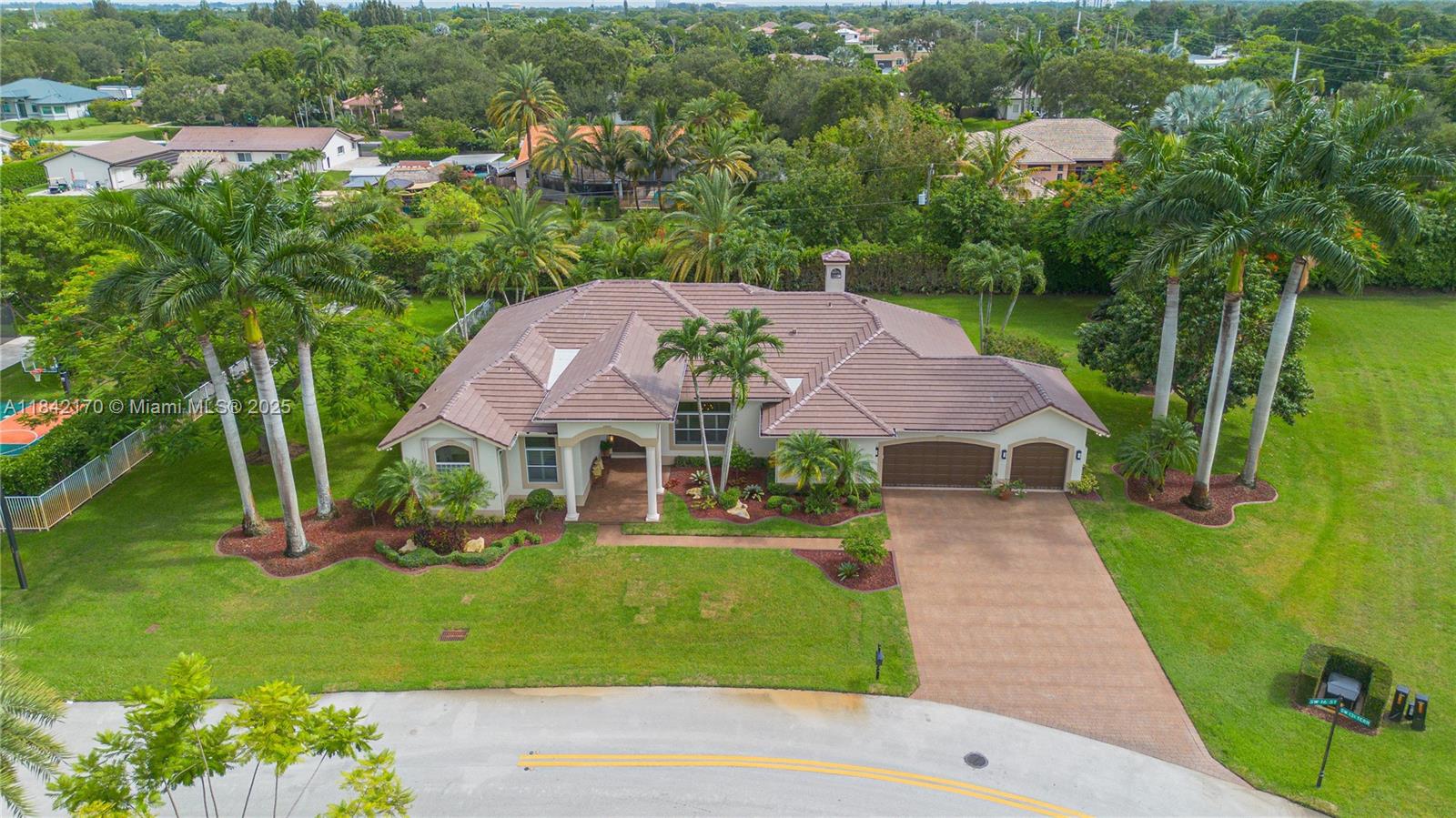 Discover luxury living in the sought-after gated community of Emerald Isles Estates - an exclusive enclave of only 38 estate homes! This stunning 5-bedroom, 3-bathroom estate home offers spacious family living with a generous 3-car garage on a beautiful builder's acre lot. Perfect for entertaining and Florida living, the pool creates your own private resort-style oasis. The property features a brand new roof, ensuring peace of mind for years to come. Located in West Davie's premier equestrian neighborhood, you'll enjoy the tranquil atmosphere while having easy access to I-75 & 595 for convenient commuting. This well-maintained community offers privacy, security, and the charm of a countryside setting. Don't miss this rare opportunity to own in one of Davie's desirable estate communities!