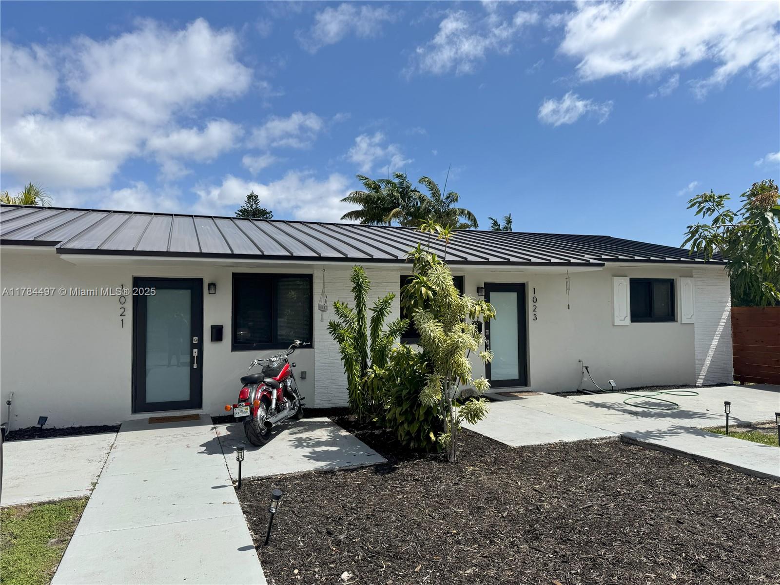 LOOK NO FURTHER. Quiet private cul-de-sac in beautiful Biscayne Park, in the heart of Miami Shores. This complete remodel boasts a 2-year-old roof & AC units, new impact glass and doors throughout. The oversized lot has a brand-new fence with a divider between the two homes for privacy. Enjoy new top-of-the-line appliances, new full-sized washer/dryers in both homes, and gorgeous high-quality vinyl floors. No expense was spared to create the perfect home for you and/or your tenants. The neighborhood is safe and lively with walkers, runners, families, and pets. Walk to parks; close to shops and restaurants. 1021 is rented through Dec 2026; owner lives in 1023. Easy to show with 24-hour notice. Listing agent will accompany. CALL TODAY FOR A PRIVATE TOUR!