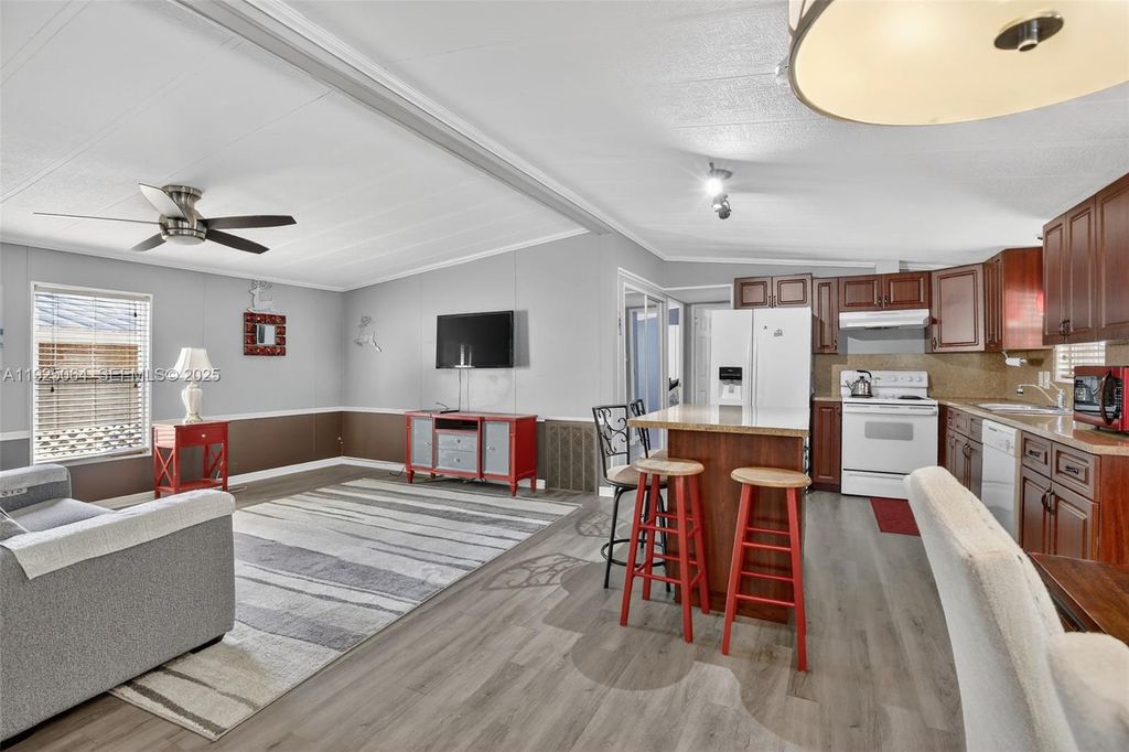 Photo of 3024 SW 52nd St, Dania Beach, FL 33312 (MLS # A11925064)